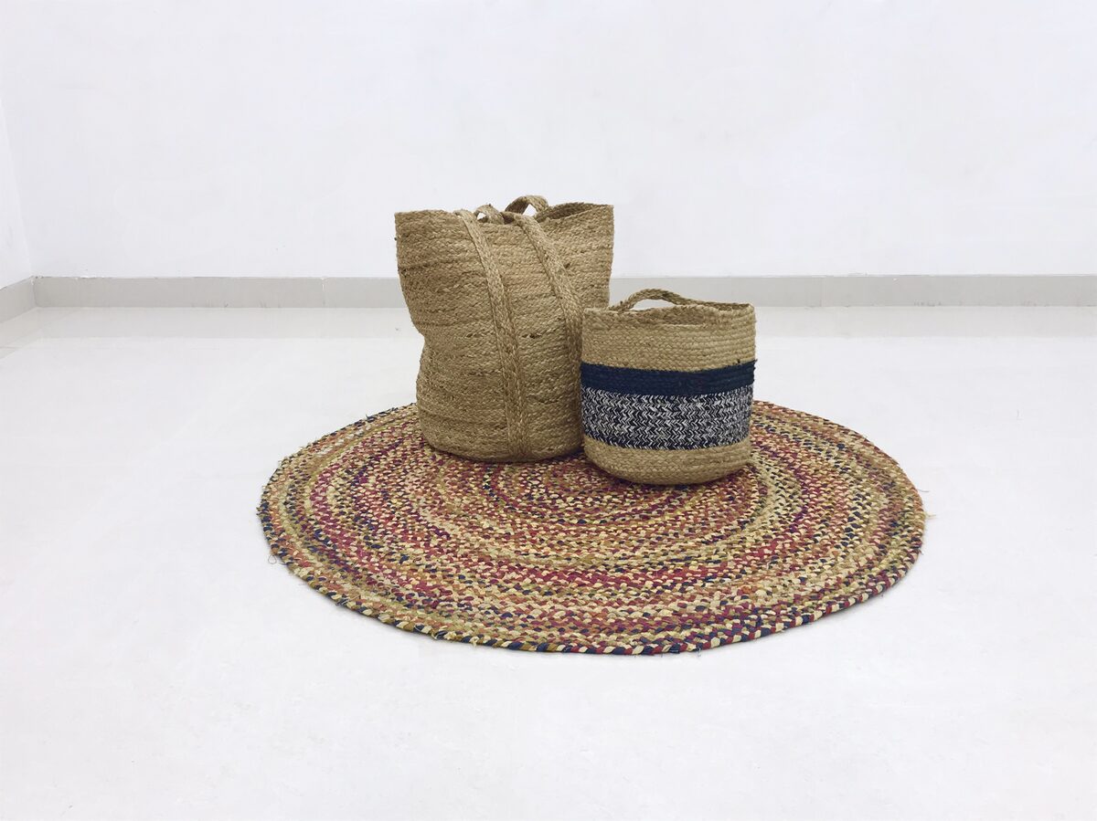 Jute bags on a braided round mat
