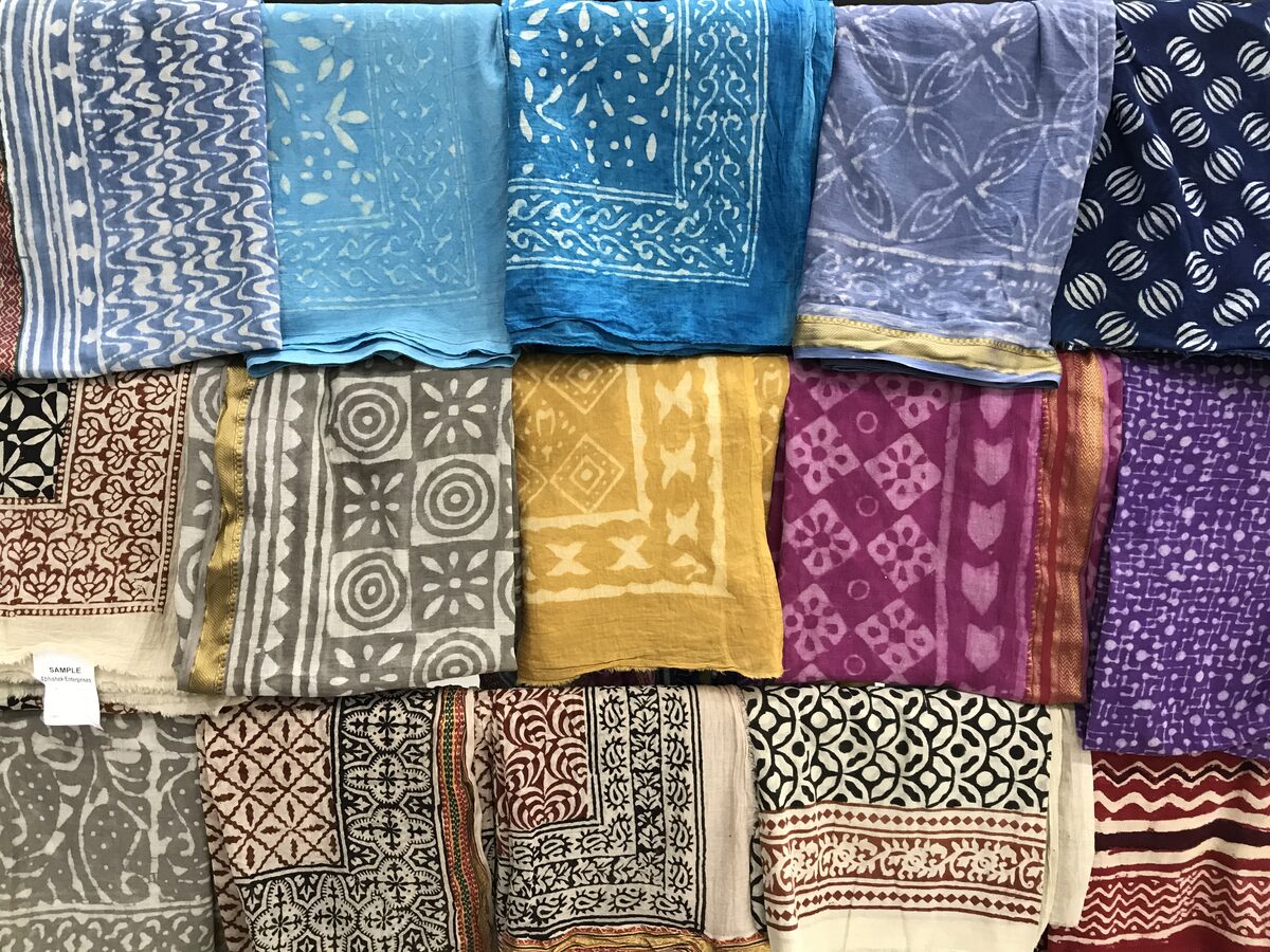 Folded block-printed scarves in many colours